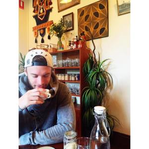 Nathan frothing off his coffee